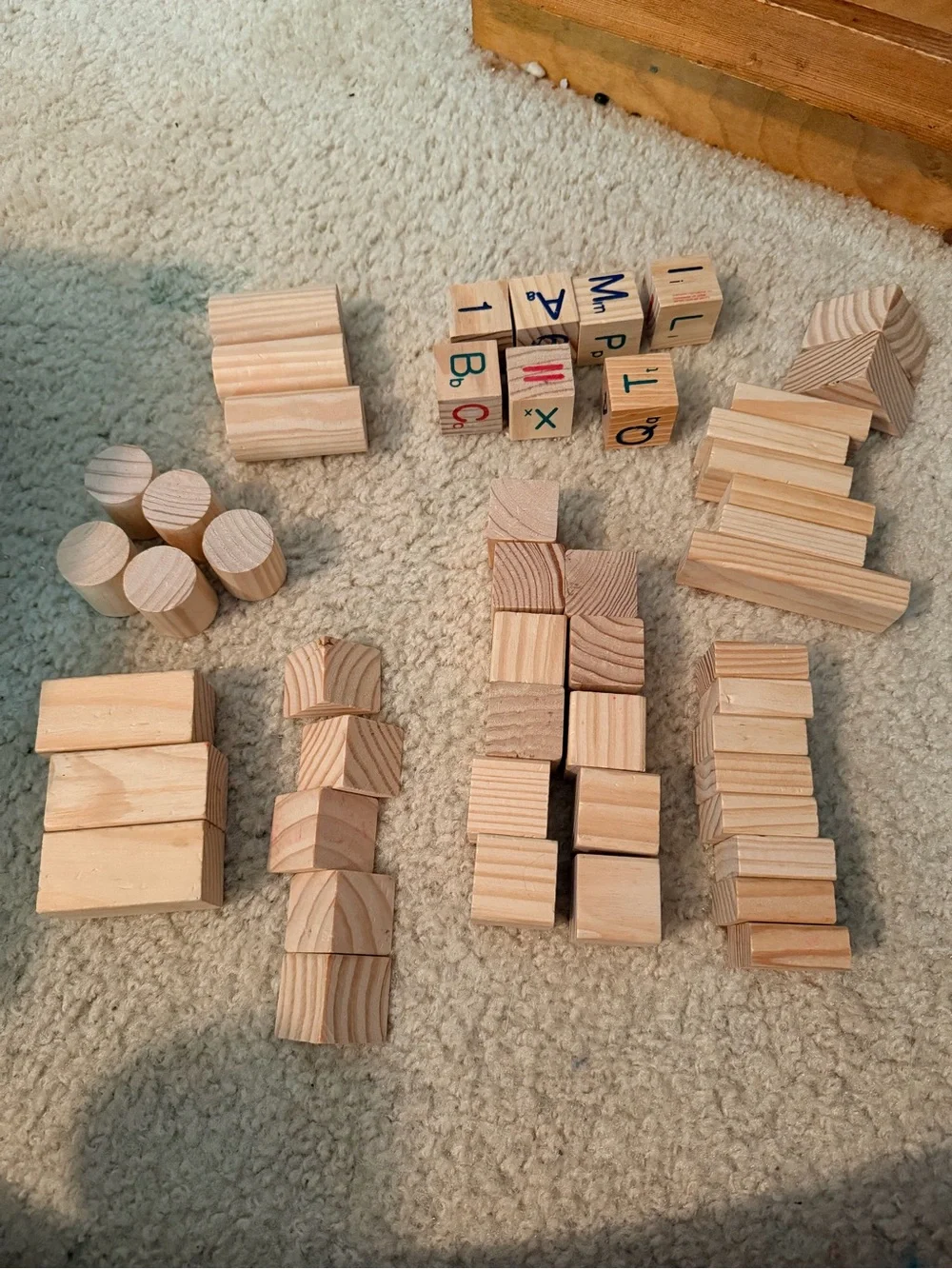 Plain wooden block set, approximately 50 blocks